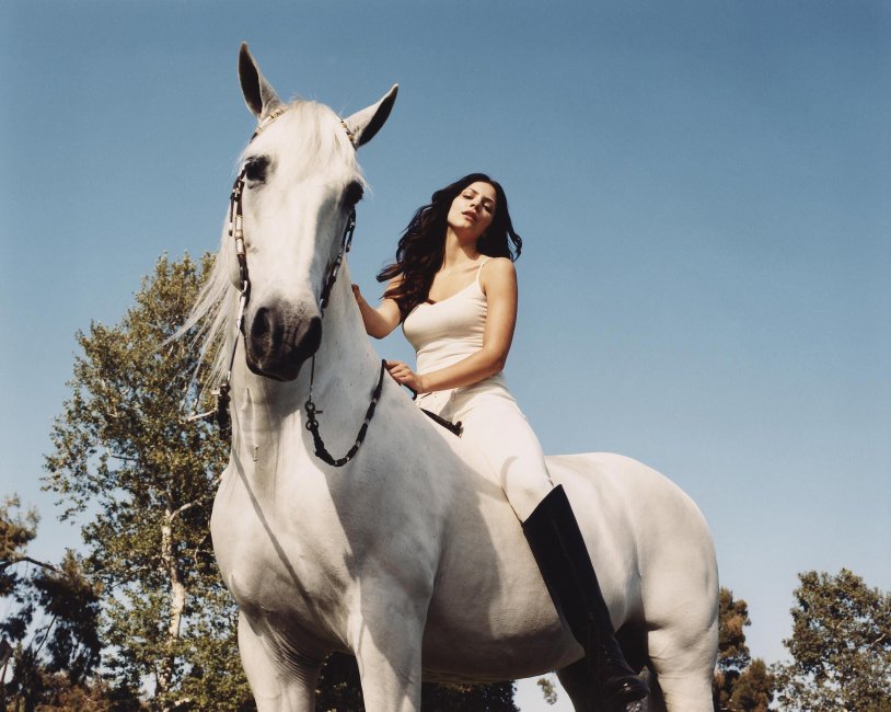 Salma Hayek riding a horse