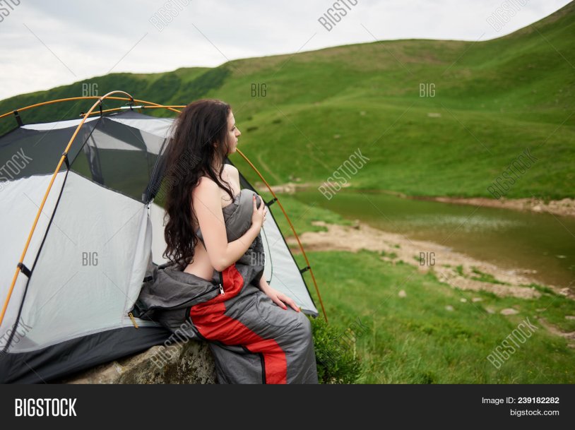 Naked tourist in a tent
