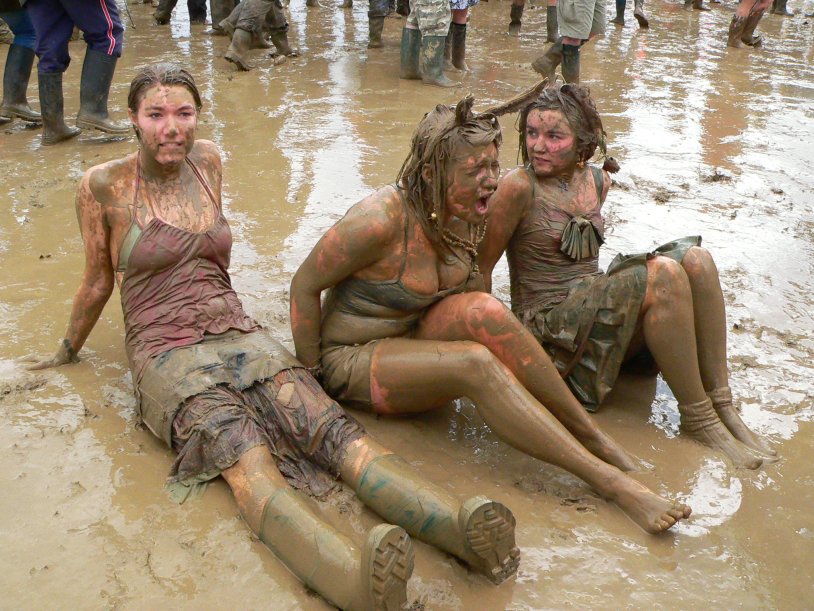 Girls in the mud in clothes