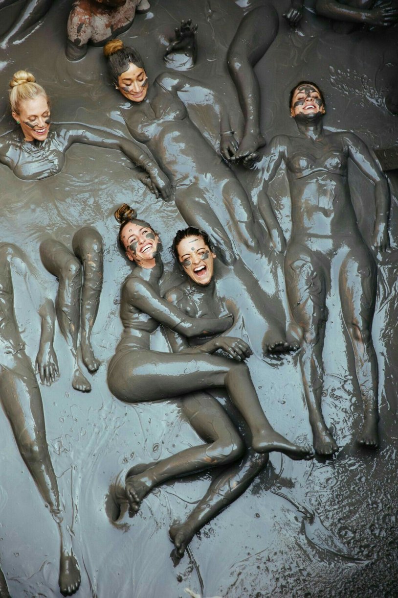 Girl in a mud bath