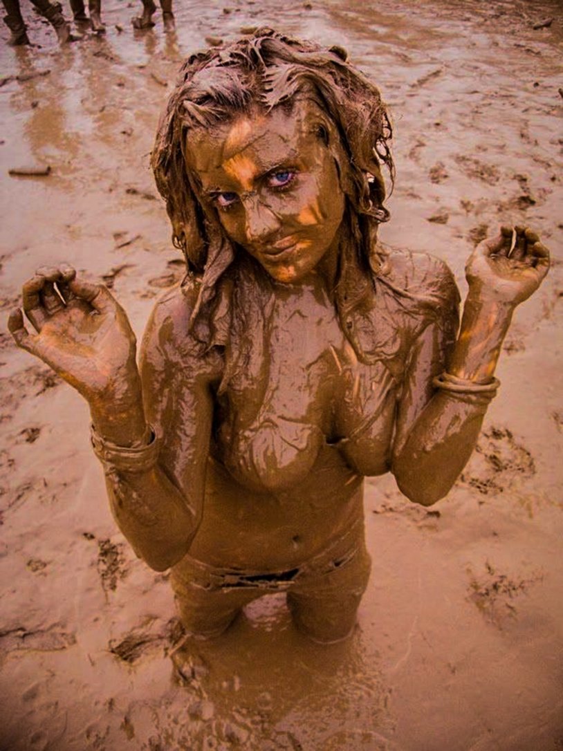 Girls in the mud bathing