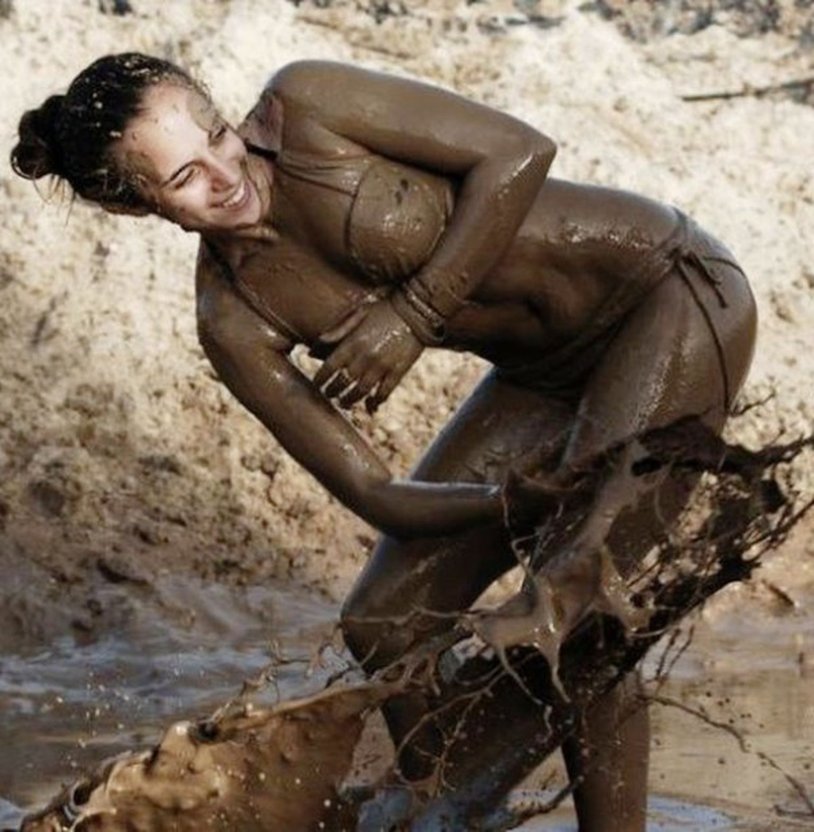 Girls in the mud bathing
