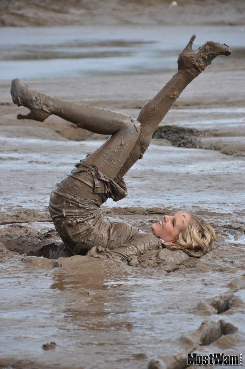 Girls in the mud bathing