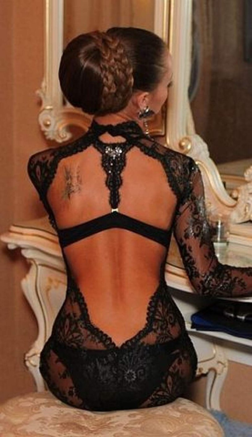 Girl in a lace dress from the back