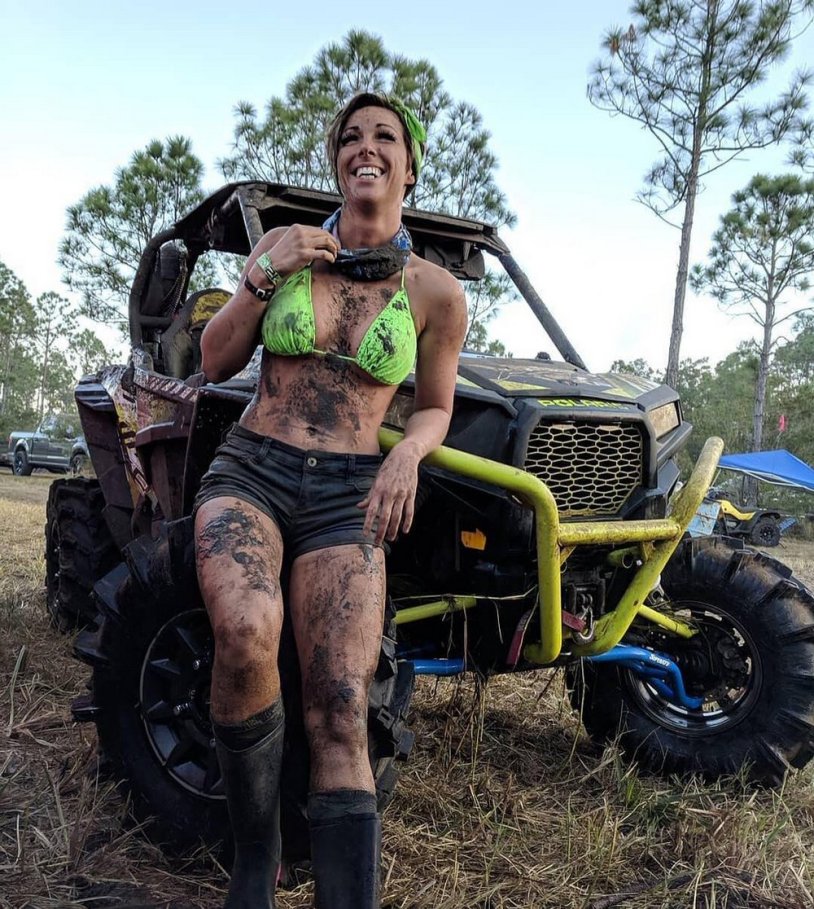 Dirty girl on an ATV