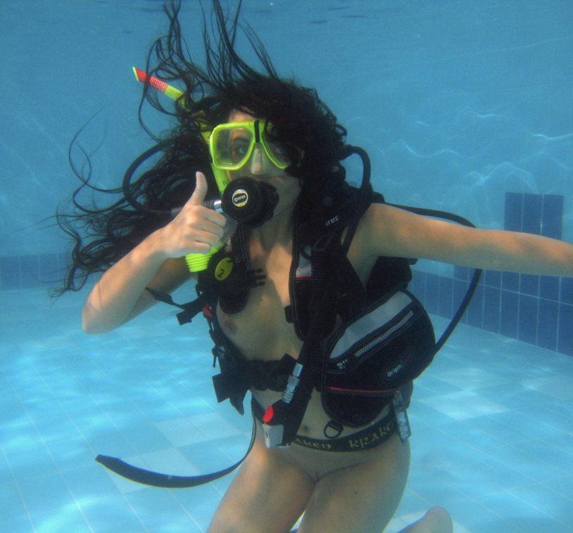 Naked with scuba dummy underwater
