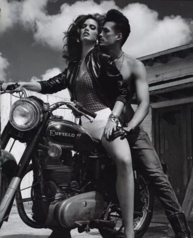 Boy with a girl on a bike