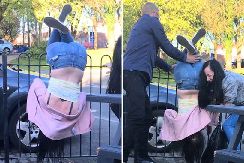 The girl got stuck in the fence