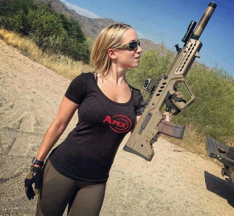 Beautiful girls with a machine gun Tavor