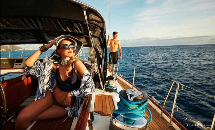 Girls rest on a yacht