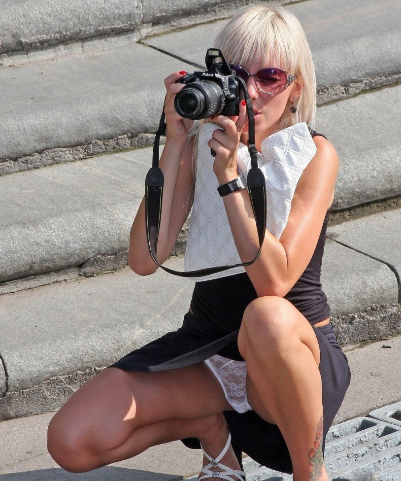 Girls squeezed photographers