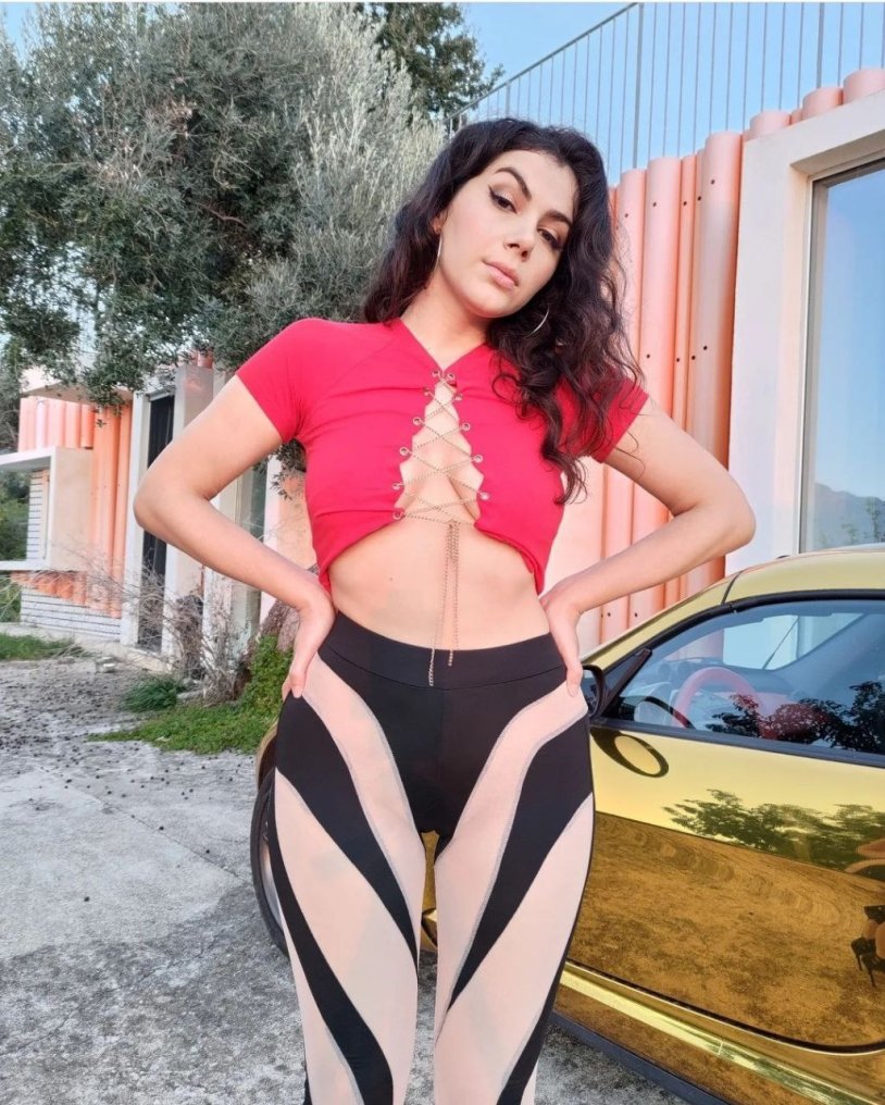 Valentina Nappi in a red dress