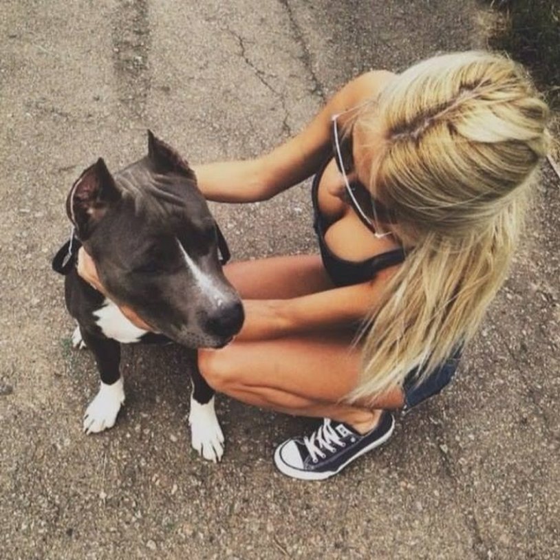 Girl blonde with a dog