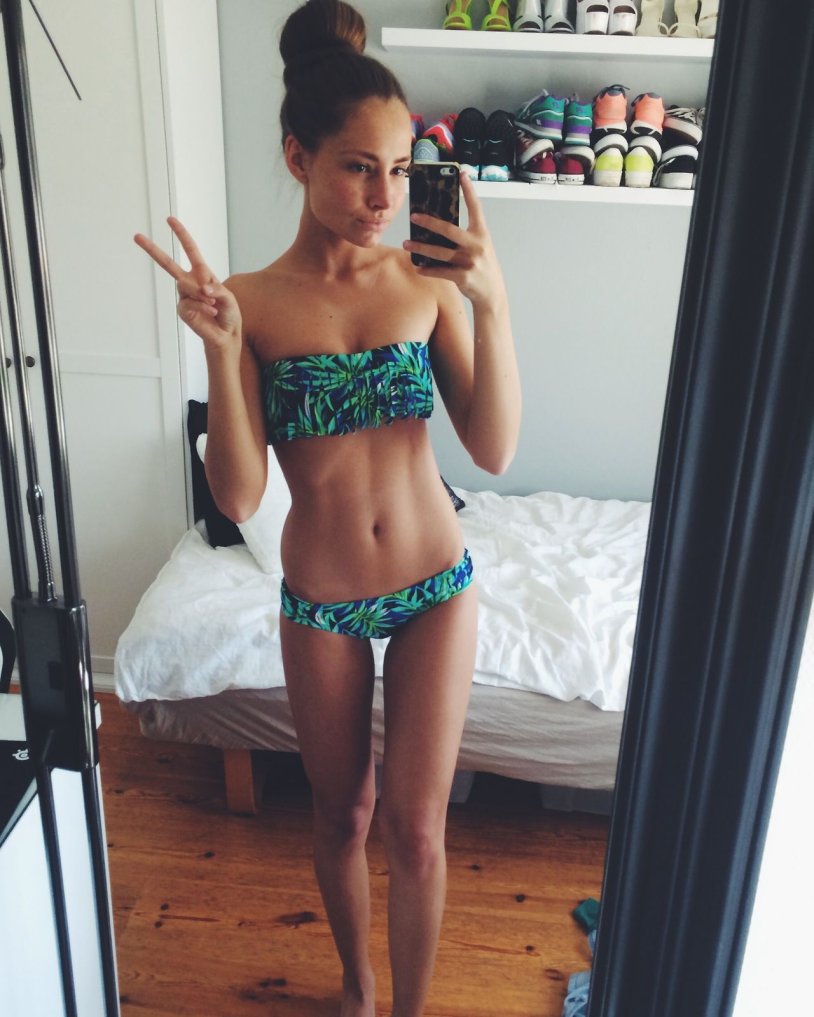 Girl in a swimsuit at home