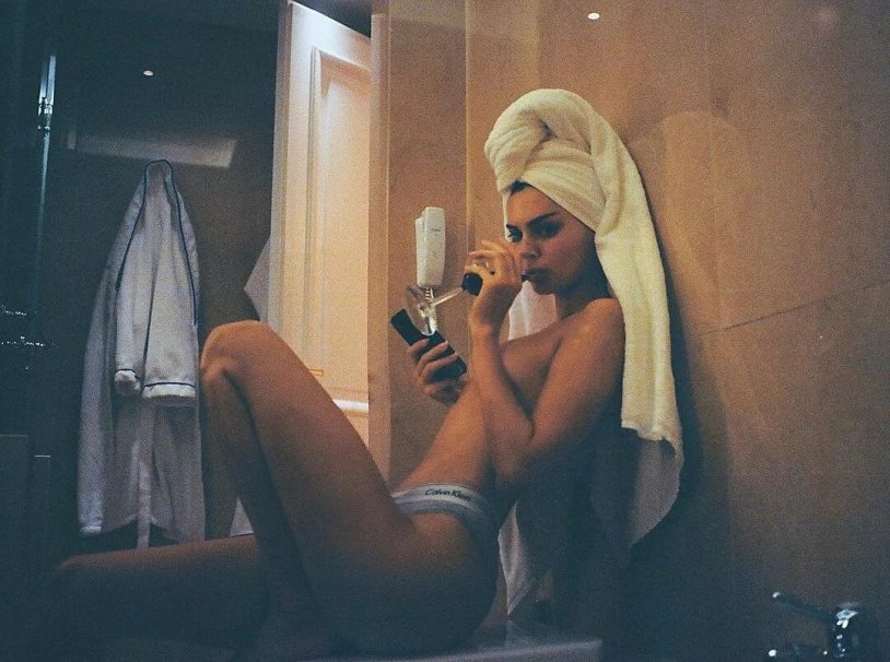Kendall Jenner with a towel on his head
