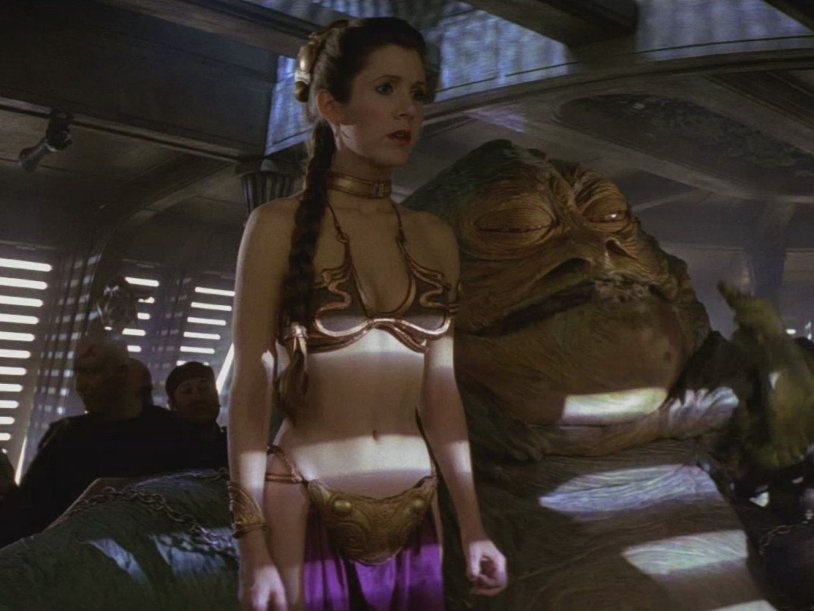 Carrie Fisher in a golden bikini
