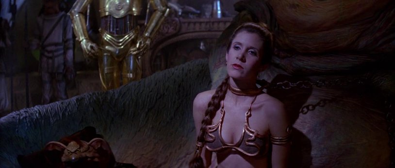 Carrie Fisher Princess Leia in a golden bikini