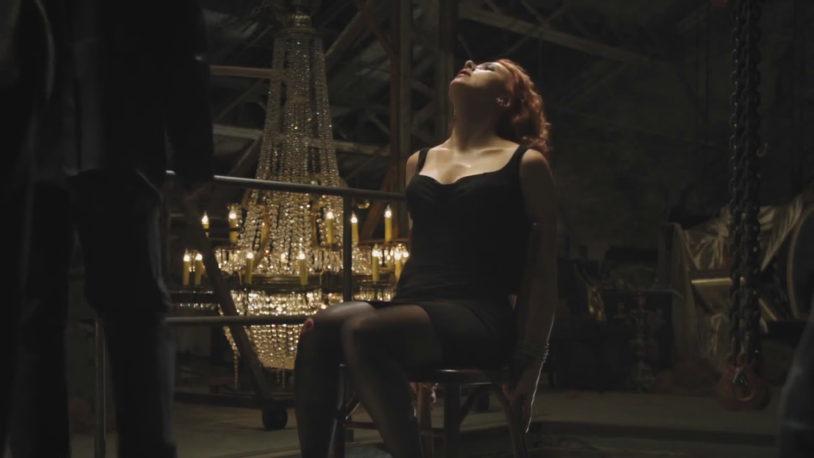 Scarlett Johansson Black Widow on a chair