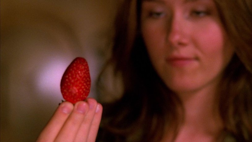 Woman eats strawberries gif