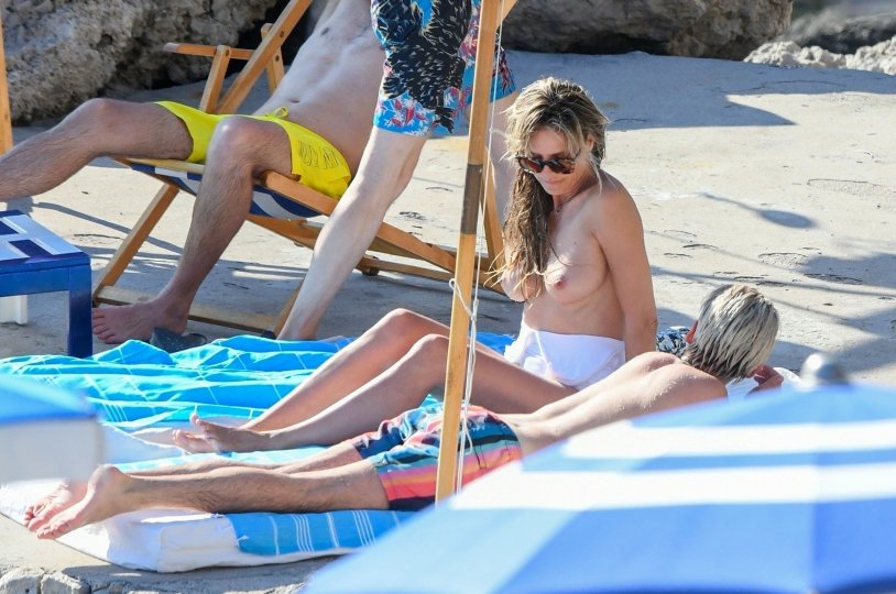 Heidi Klum is tanning topless