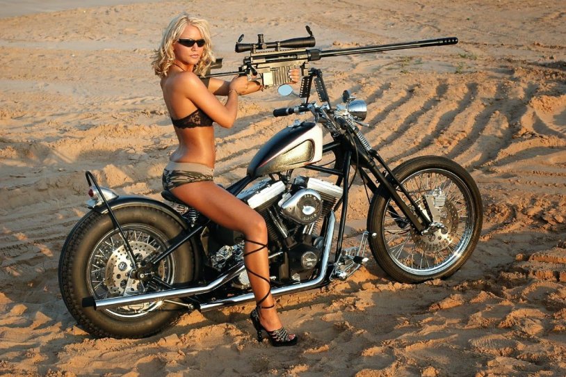 Girl on a bike with weapons