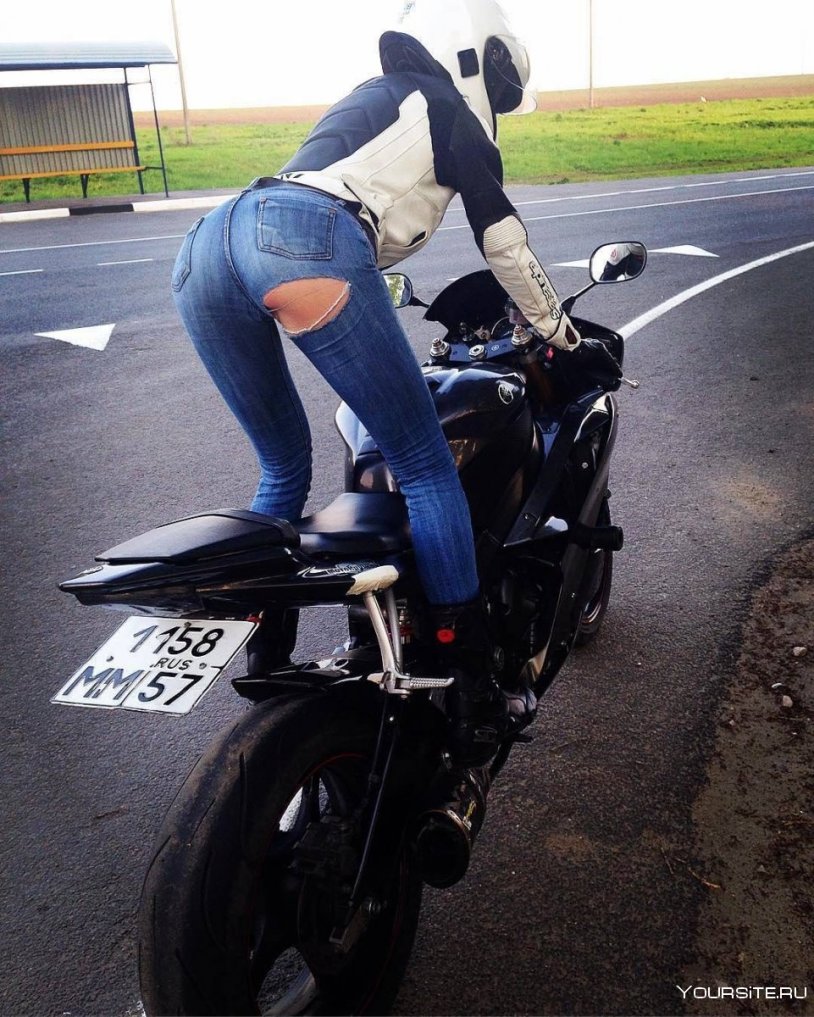 Board of a girl on a motorcycle