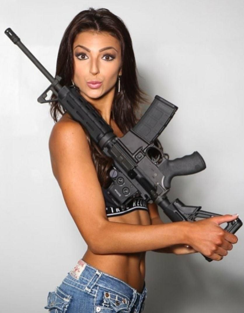 Girl with weapons rifle