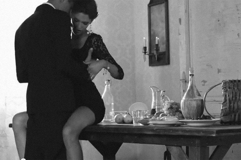 Girl sits on a kitchen table