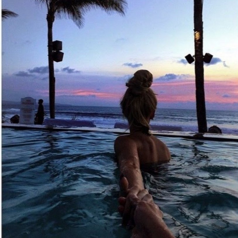 Girl in the pool from the back