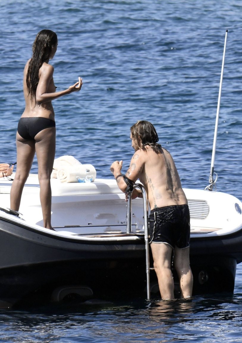 Zoe Saldan on the yacht topless