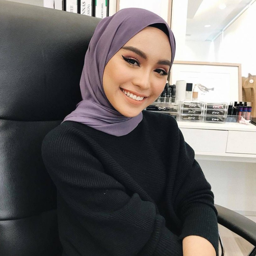 Woman in a hijab with big tits