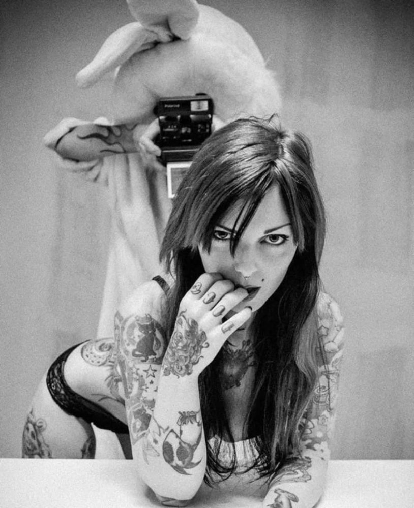 Tattooed girls with fak