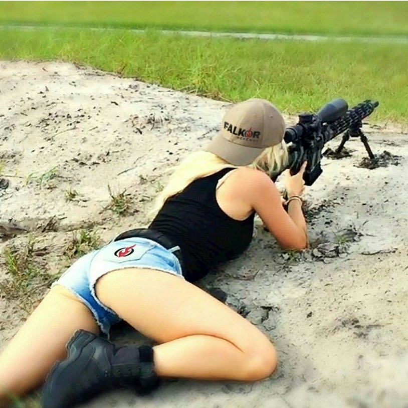Girls shoot weapons