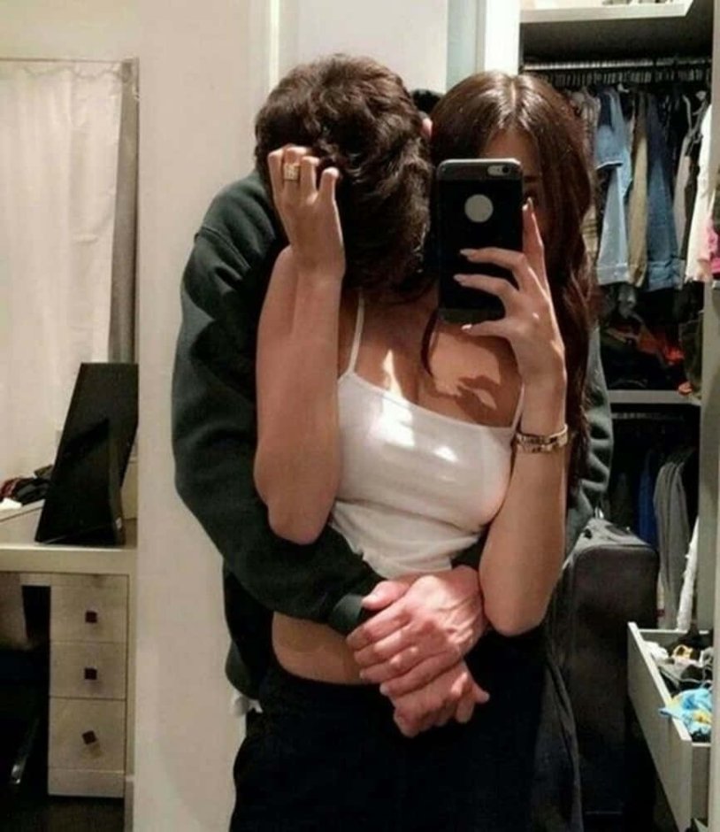 The guy takes pictures of the girl