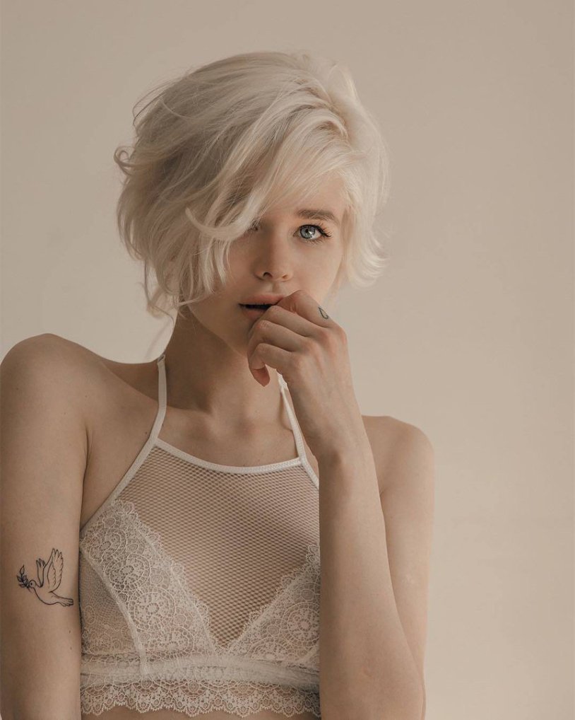 Girl with short white hair