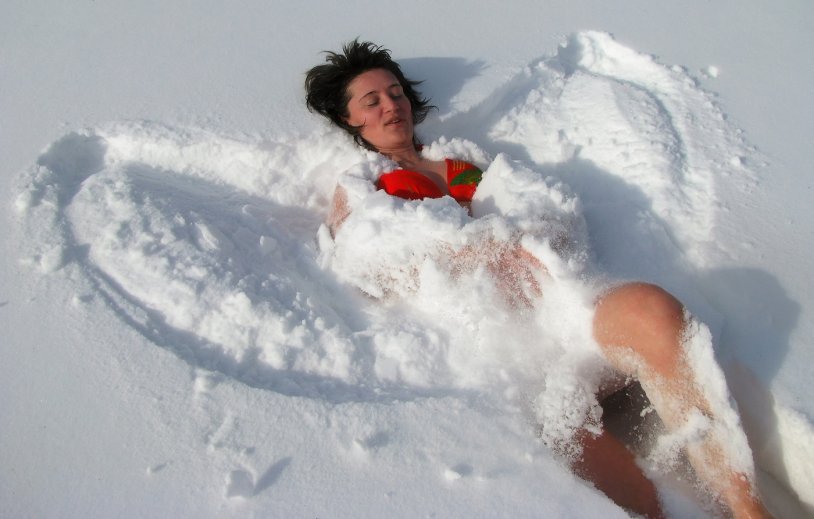 Girl swimming in the snow