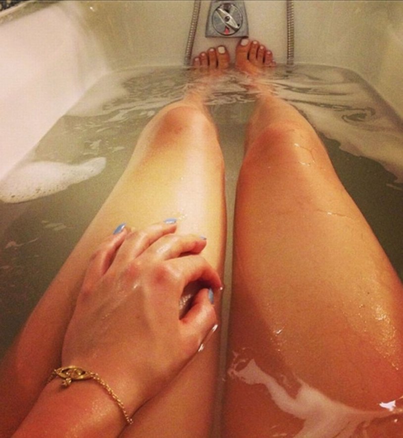 Women's legs in the bathroom