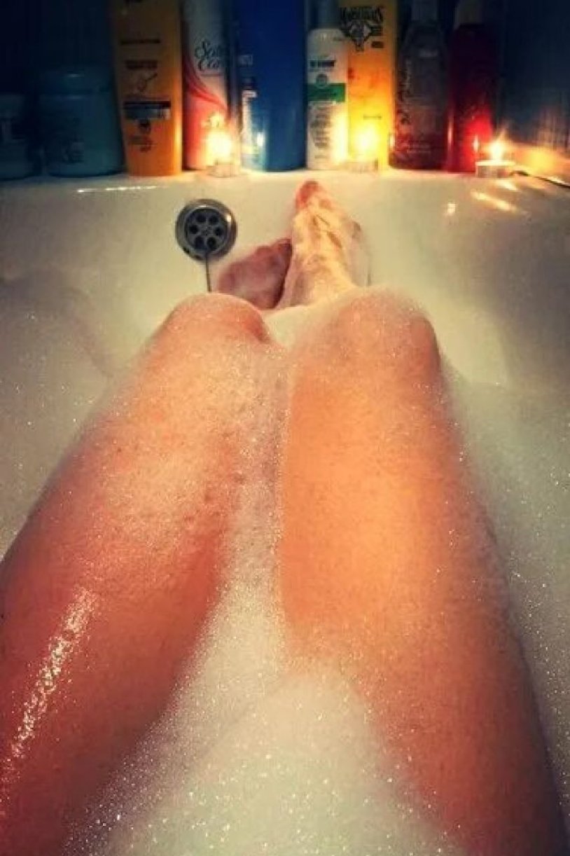 Women's legs in the bathroom