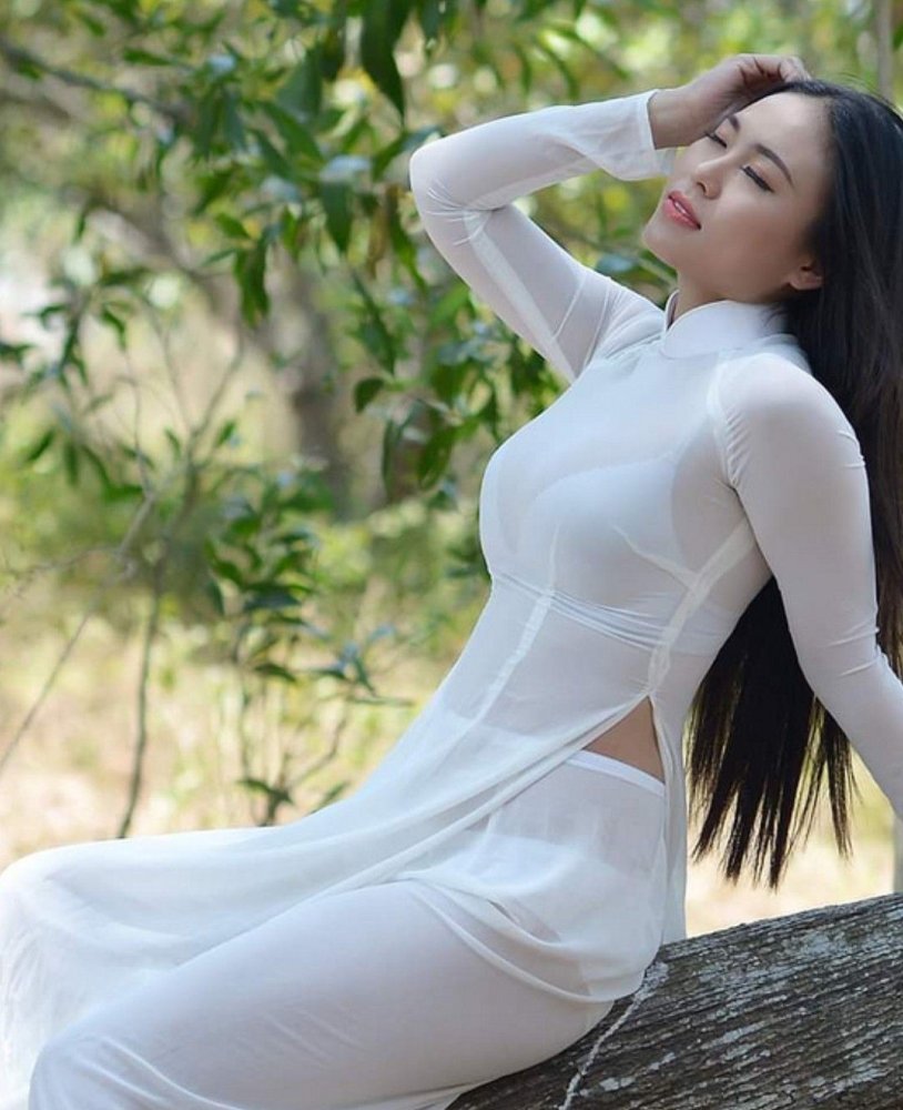 Beautiful Vietnamese girls in a dress Breast Breast