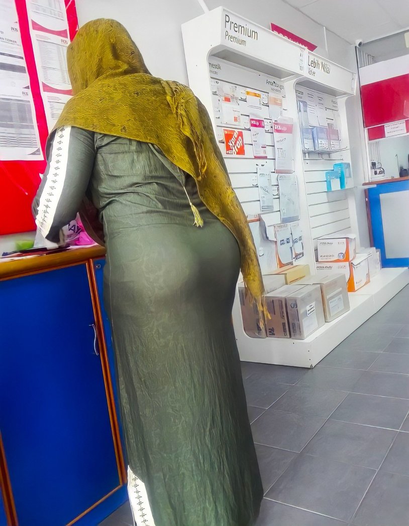 Leaned in a hijab in a store