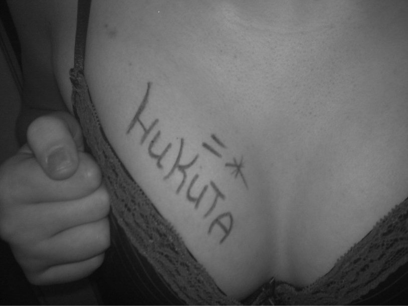 Breast with the inscription Nikita