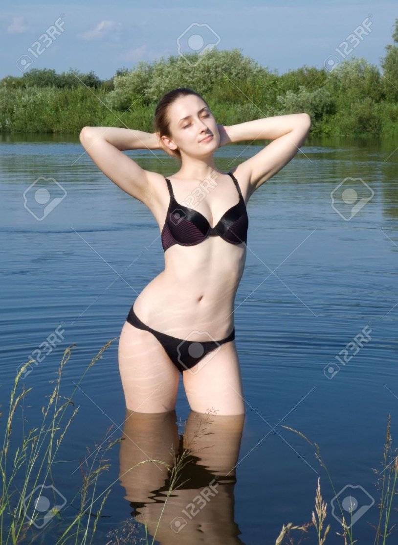 Women on the river in a swimsuit