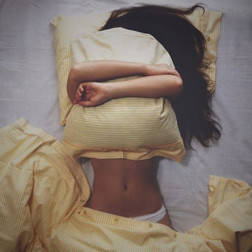 Girl face in a pillow