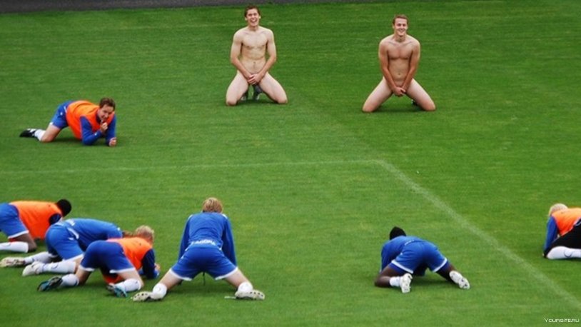 Naked football players on the field