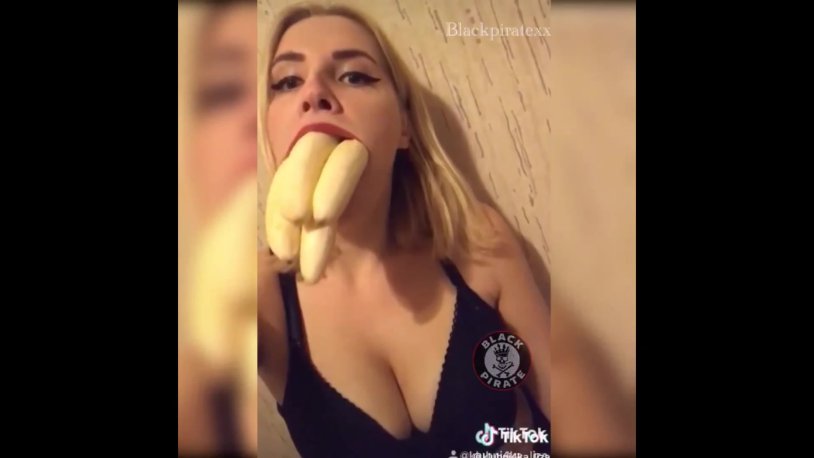 Girl with a banana in the mouth of a selfie