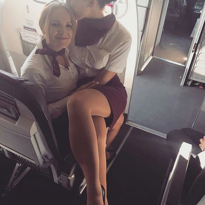 Lesbian stewardesses on an airplane
