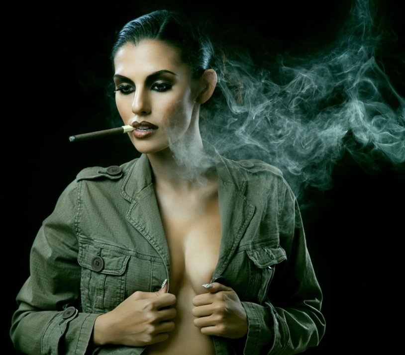 Beautiful girls with a cigar