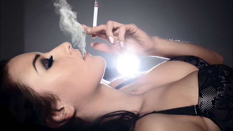 The woman smokes a cigar