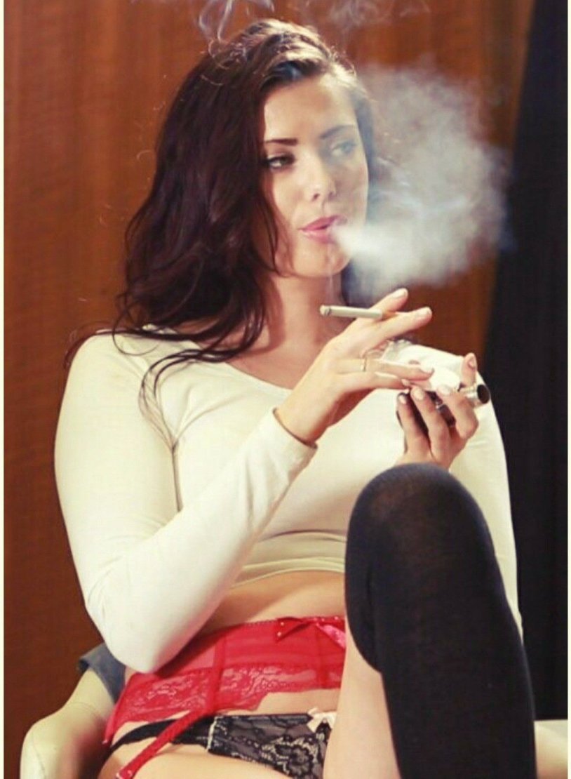 Smoking girl in a bra