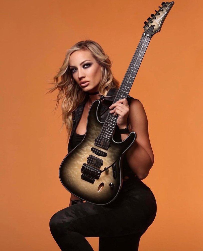 NITA Strauuss guitarist